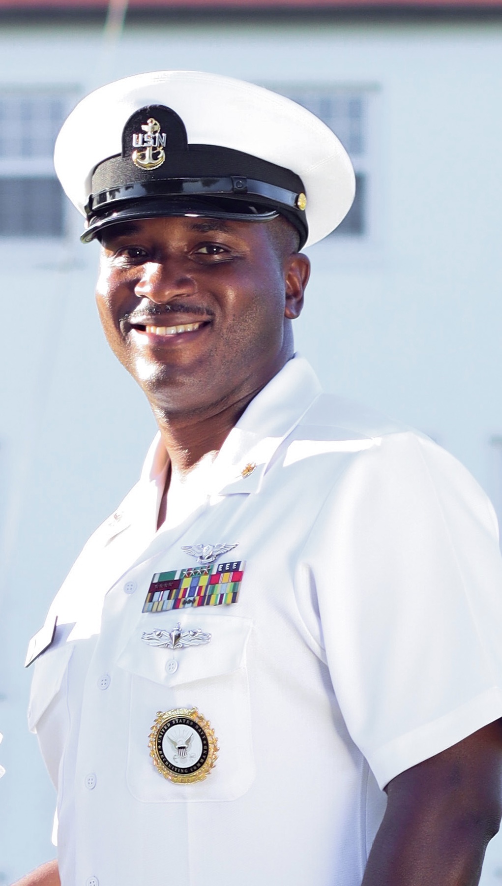 Chief Jason Lewis in United States Navy dress white uniform