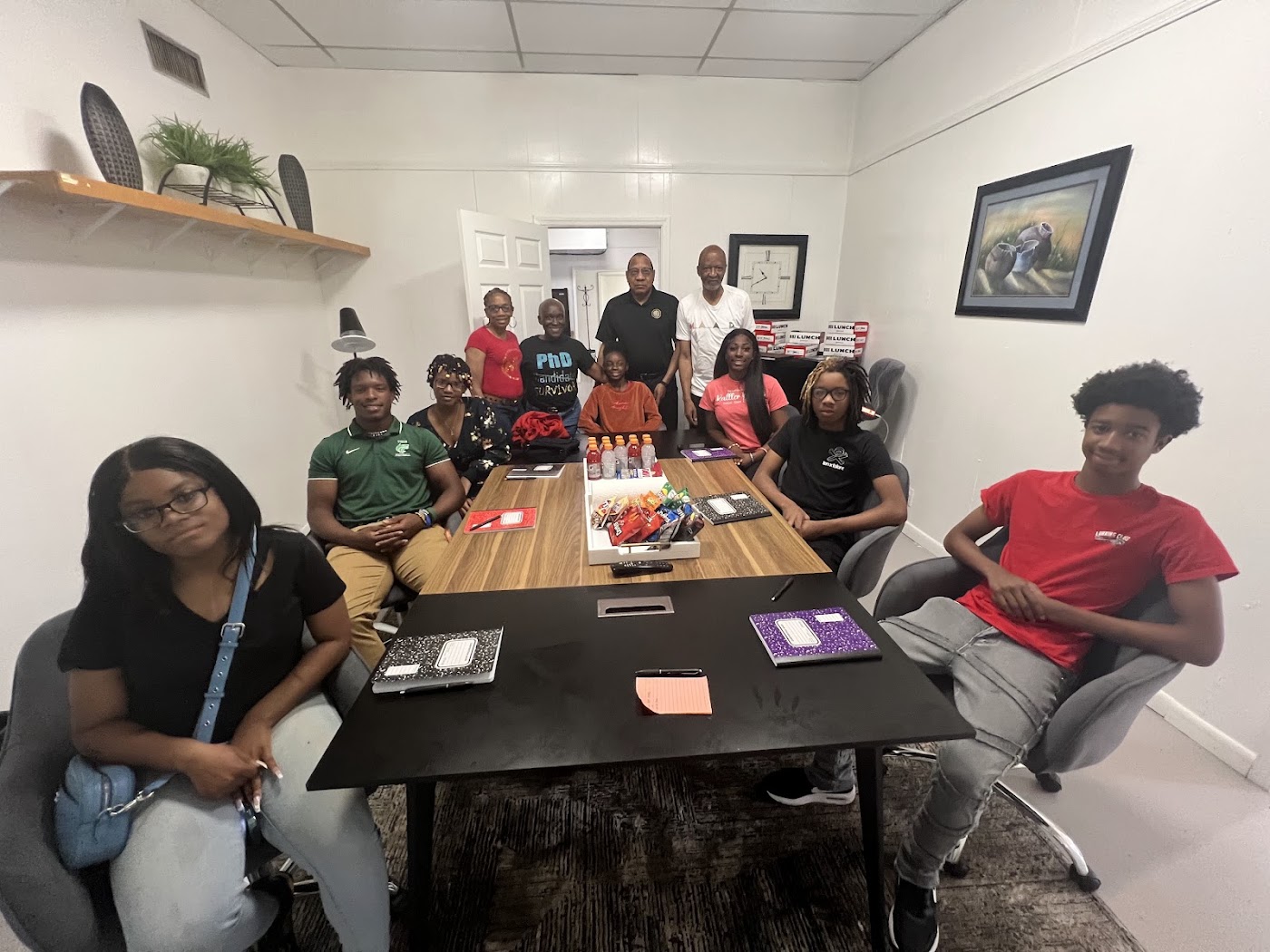 Students and mentors gather for a group portrait during the Africatown STEAM project